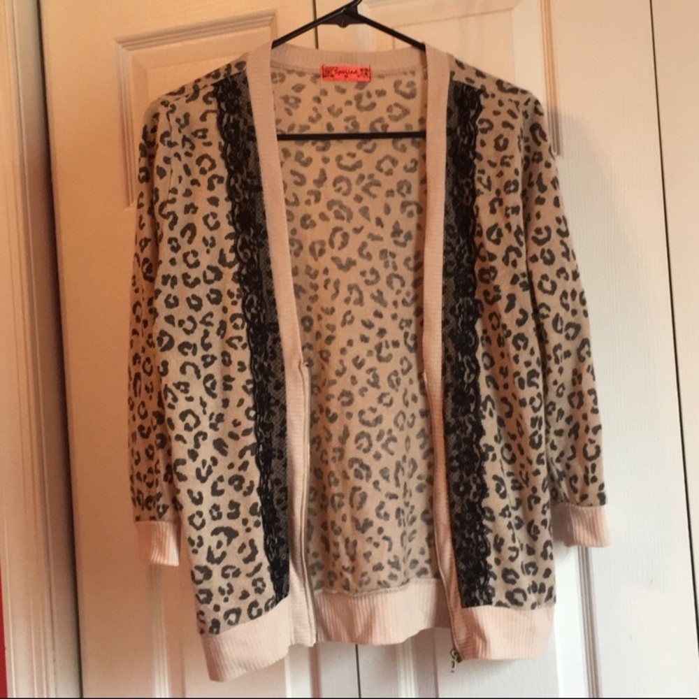Nude/cheetah print shaw with black lace + zipper